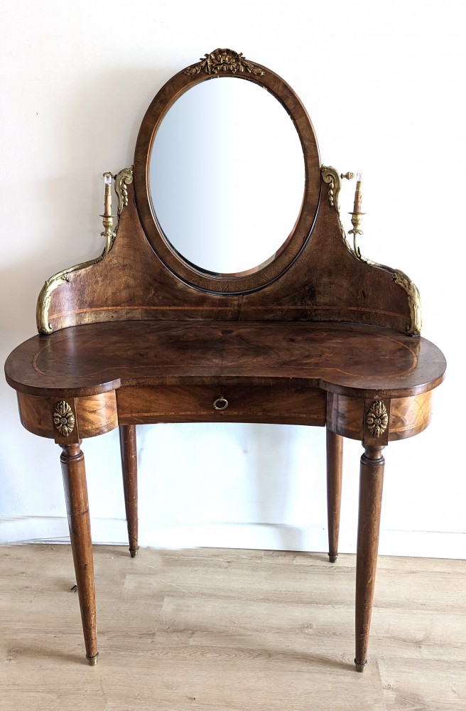 COIFFEUSE en bois de placage de forme rognon...