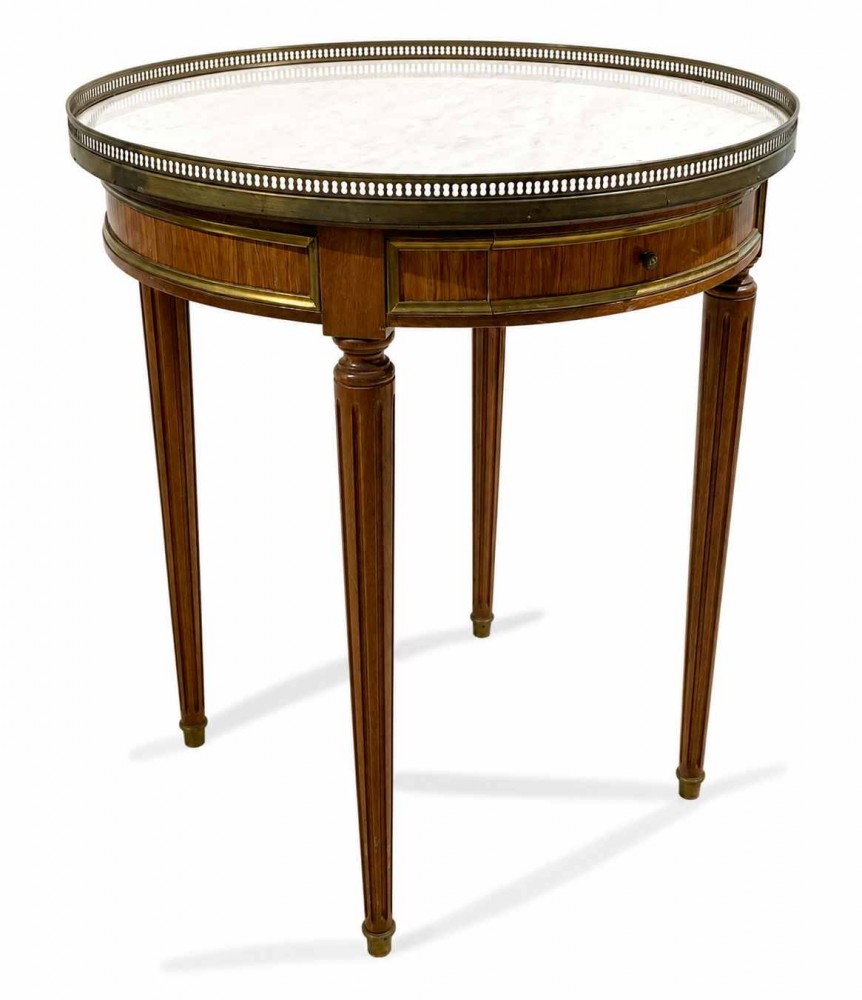TABLE BOUILLOTTE en acajou et placage d’acajou...