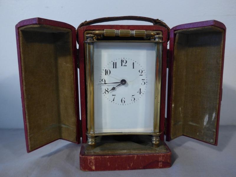 PENDULE D'OFFICIER en dans sa cage à trois...