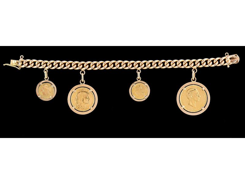 BRACELET gourmette en or jaune (750) à quatre...