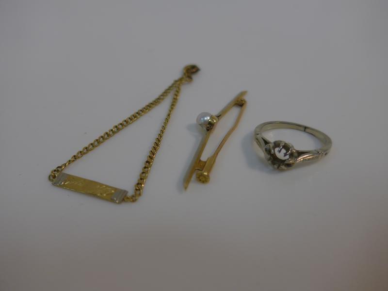 PETIT LOT d'or (750) comprenant un broche...