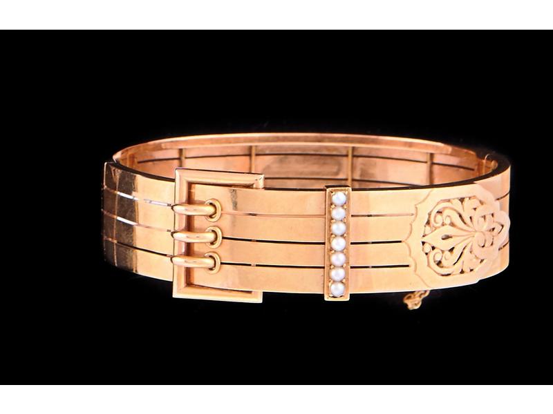 BRACELET rigide articulé en or jaune (750),...
