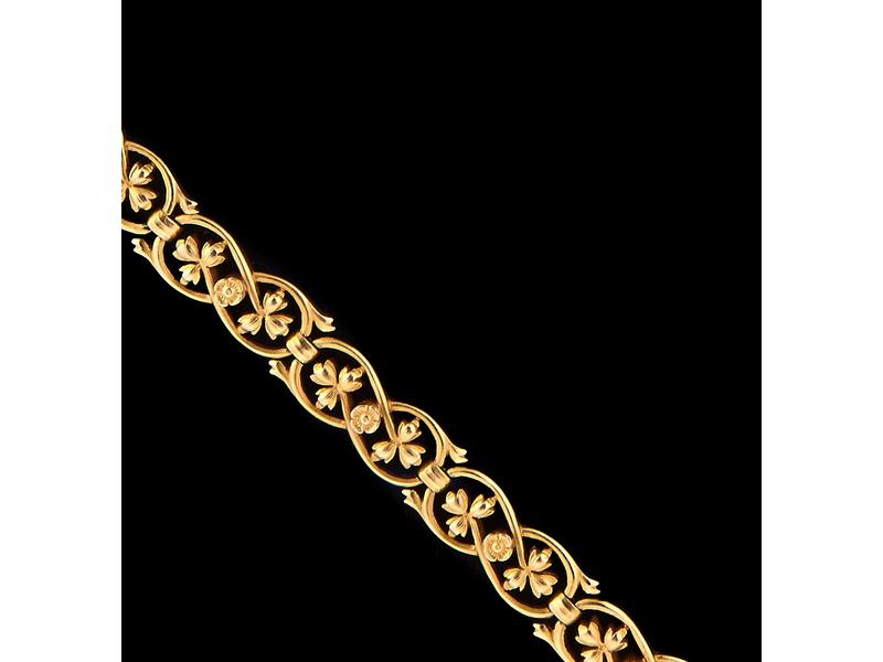 BRACELET articulé en or jaune (750), à mailles...
