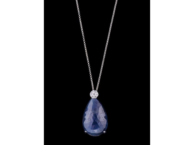 PENDENTIF en or gris (750) serti d'un saphir...