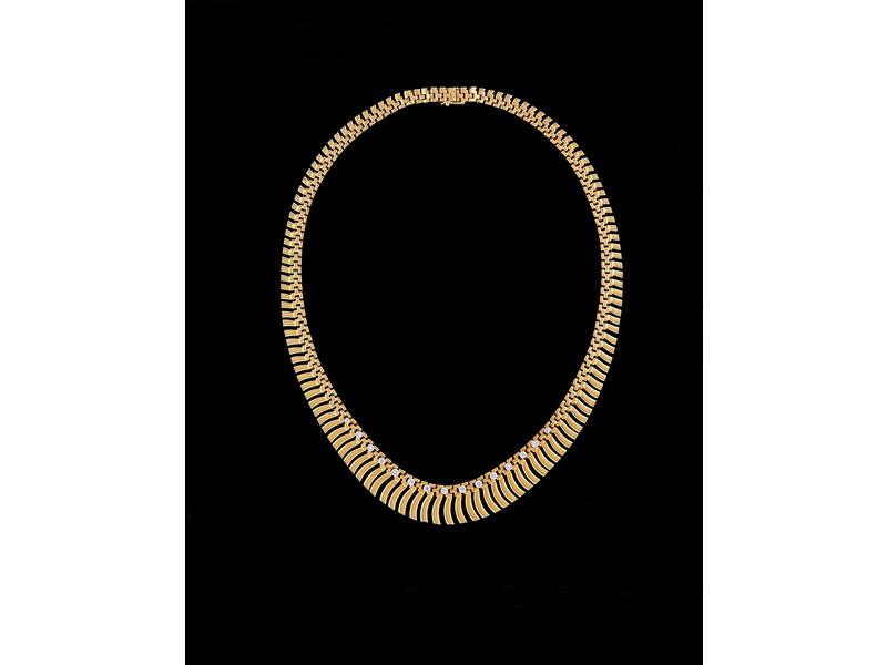 COLLIER en chute à mailles souples en or...