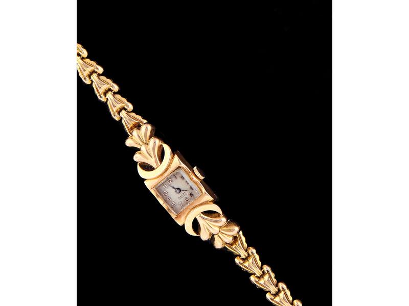 MONTRE bracelet de dame en or jaune (750),...