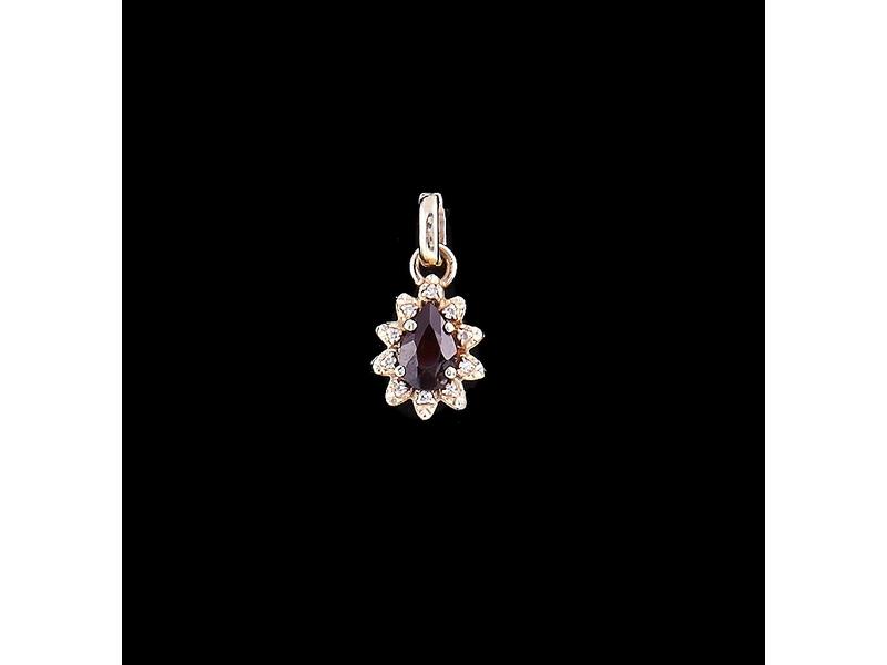 PENDENTIF en or blanc (750) serti d'un rubis...