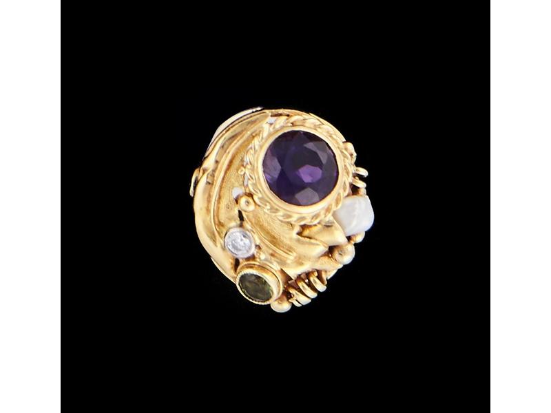 BAGUE en or jaune (750) sertie d'une ametyste,...