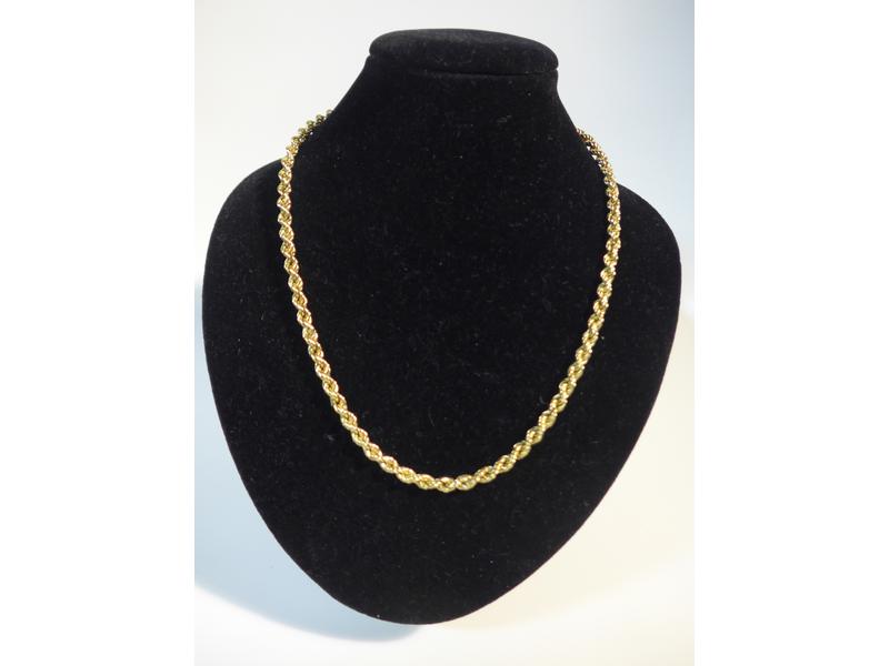 COLLIER en or jaune (750) torsadé.
