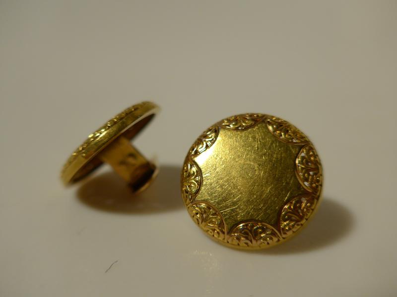 PAIRE DE BOUTONS DE MANCHETTES en or, de...
