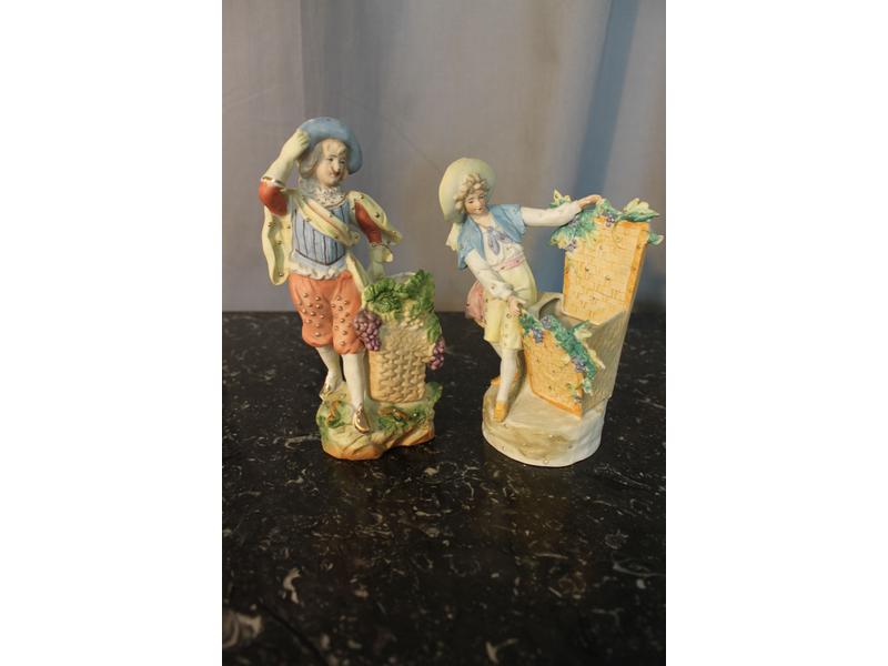 DEUX PORTE-ALLUMETTES en biscuit polychrome...