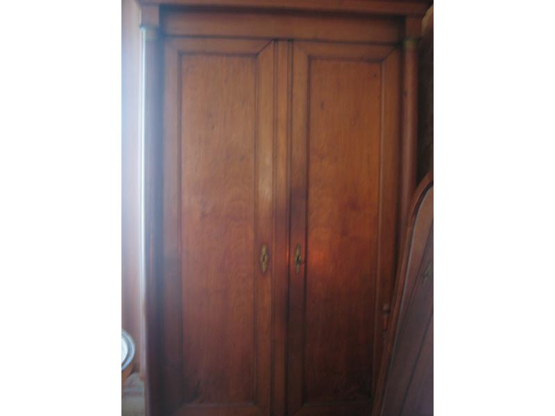 IMPORTANTE ARMOIRE en acajou et placage d’acajou,...