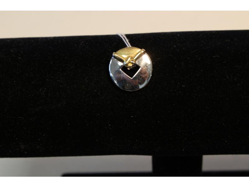 PENDENTIF en or jaune et or gris (750), en...