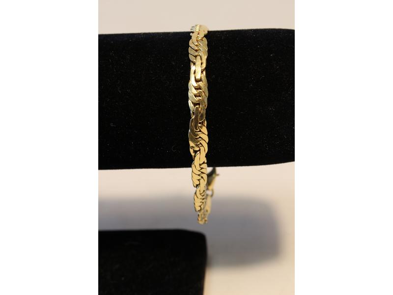BRACELET gourmette en or jaune (750).