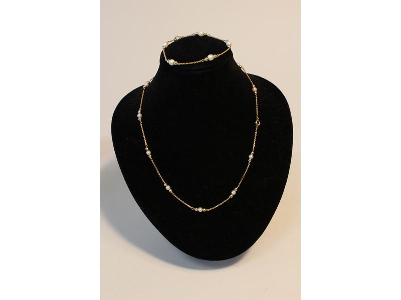 COLLIER ET BRACELET en or jaune (750) à chaînette...