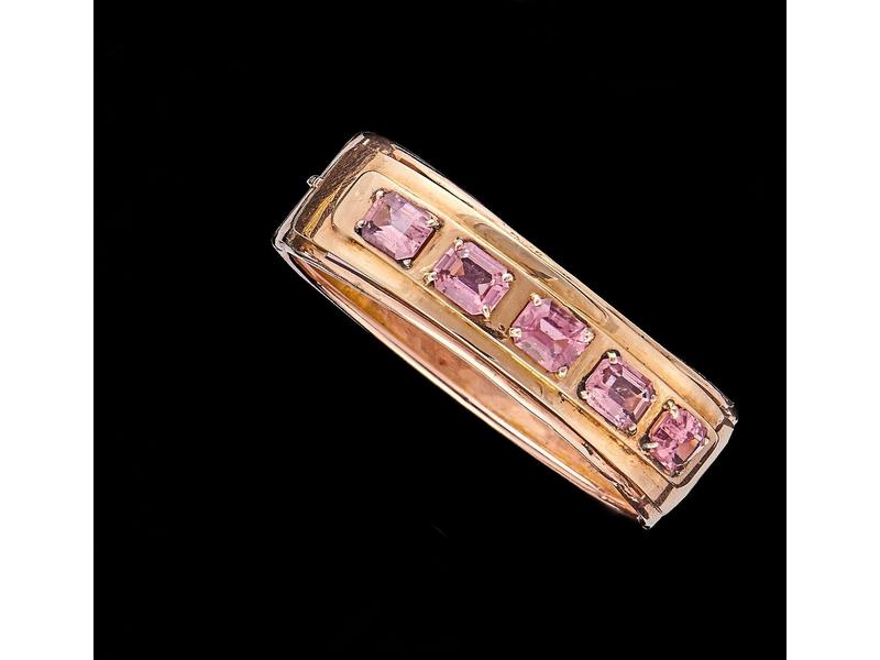 BRACELET rigide articulé en or jaune (585)...