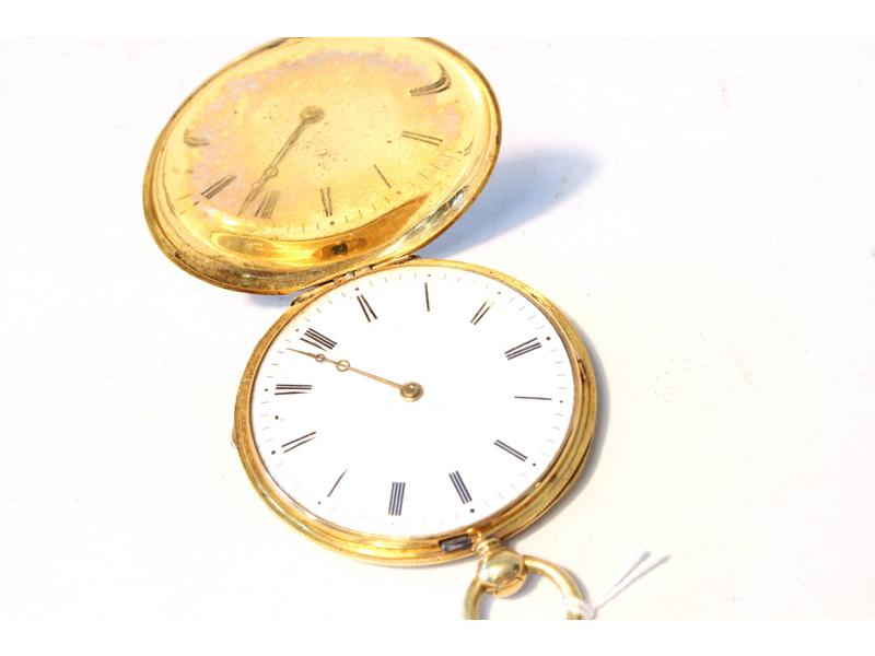MONTRE DE POCHE en or jaune (750), à double...