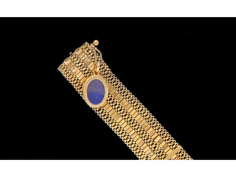 BRACELET en or jaune (750), à cinq rangs...