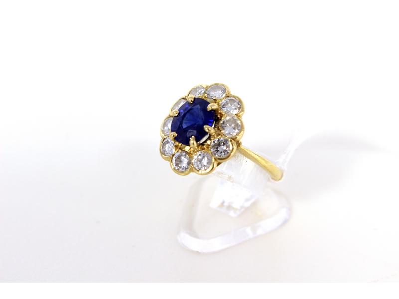 BAGUE MARGUERITE en or jaune (750) sertie...