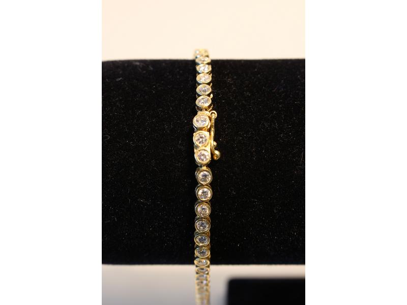 BRACELET SOUPLE en or jaune (750) sertie...