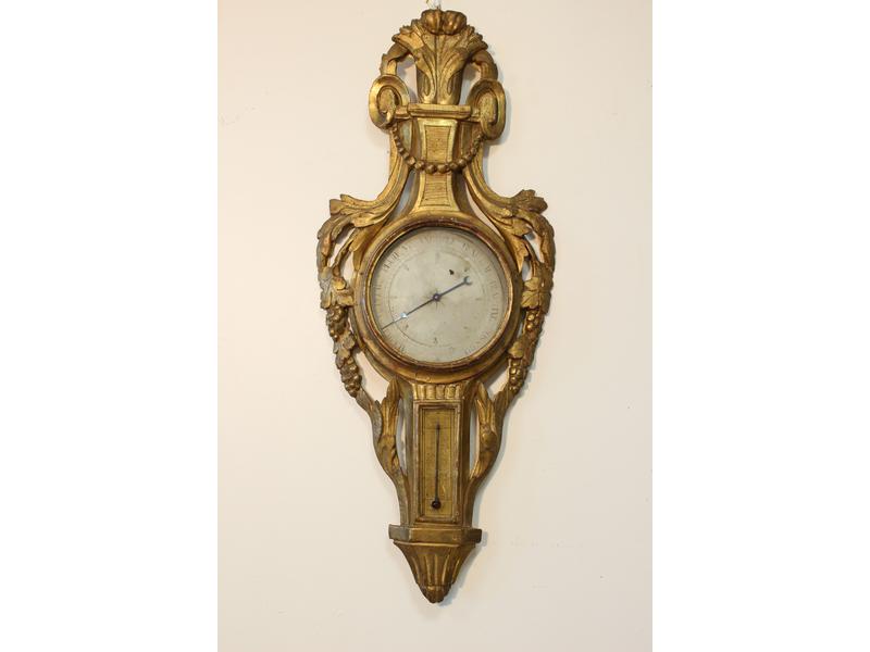 BAROMETRE en bois sculpté et doré