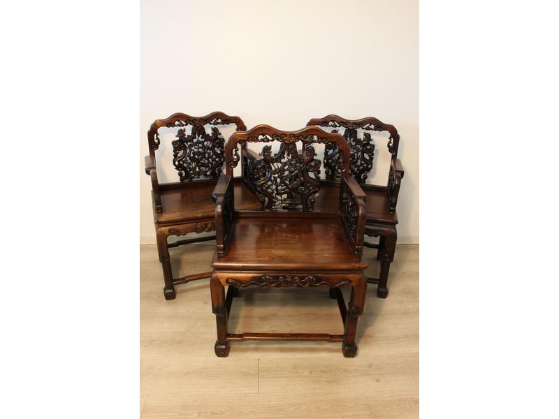 SUITE DE TROIS FAUTEUILS en bois exotique...