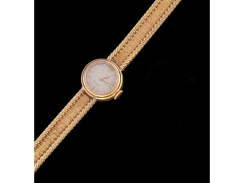PETITE MONTRE BRACELET de dame en or jaune...