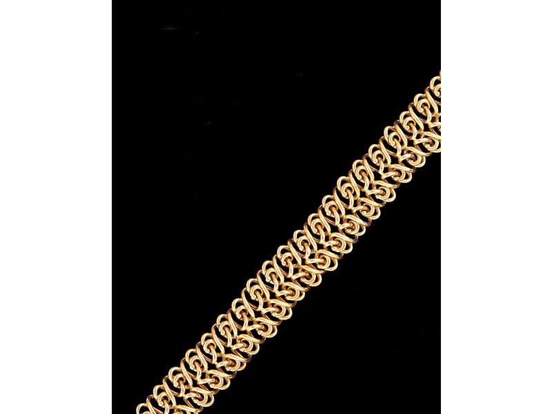 BRACELET à mailles articulées en or jaune...