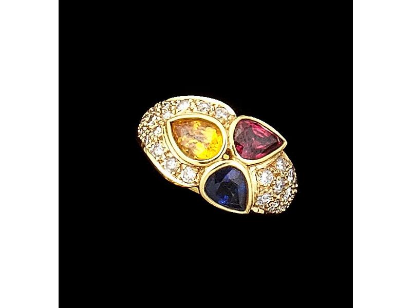 BAGUE en or jaune avec 3 saphirs de couleurs,...