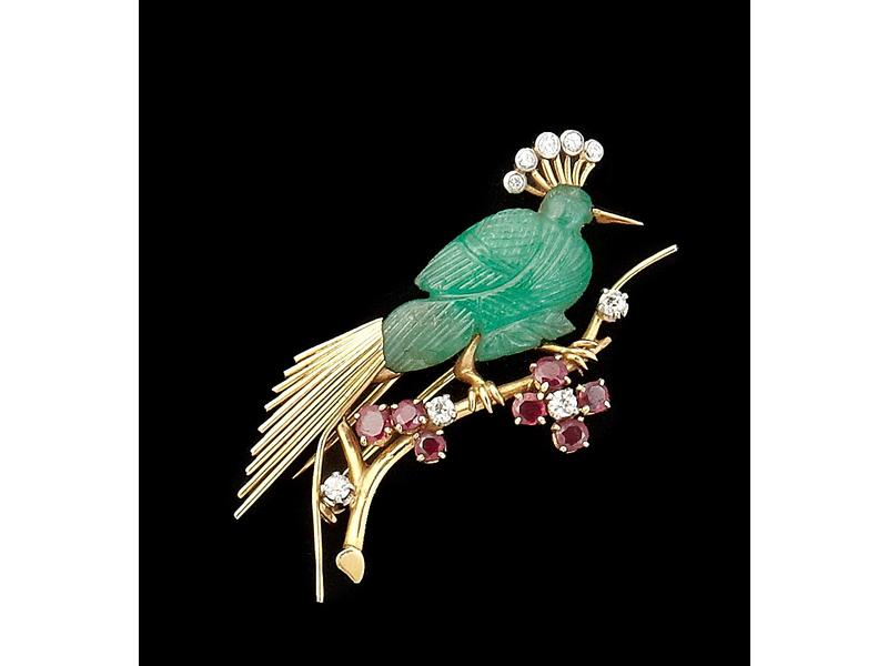 BROCHE en or jaune stylisant un oiseau de...