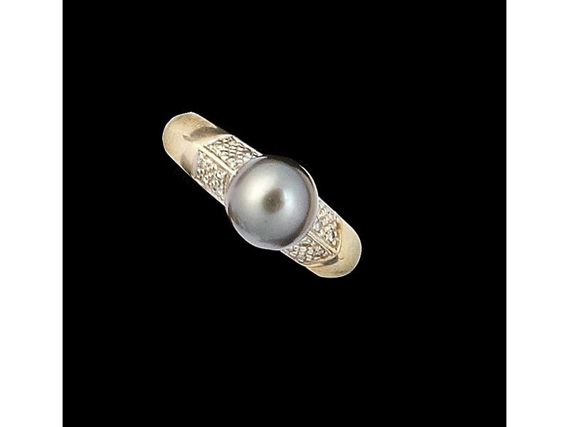 BAGUE jonc en or gris montée avec une perle...