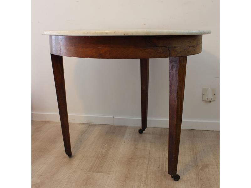 TABLE ronde en acajou et placage d'acajou,...