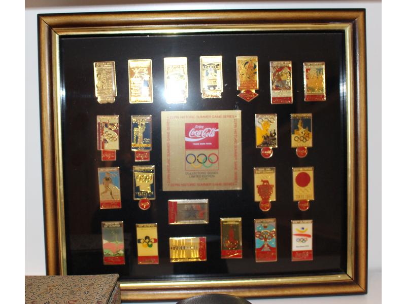 COLLECTION DE 22 Pin’s Coca-Cola commémoratifs...