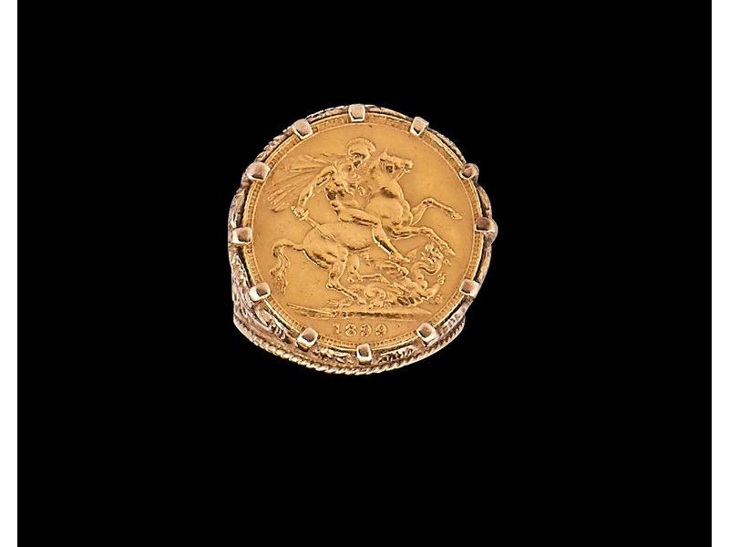 BAGUE en or jaune 9k (375), sertie d'un souverain...