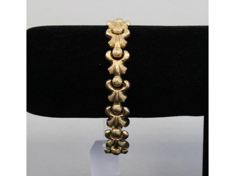 BRACELET en or jaune (750), à maillons articulé...
