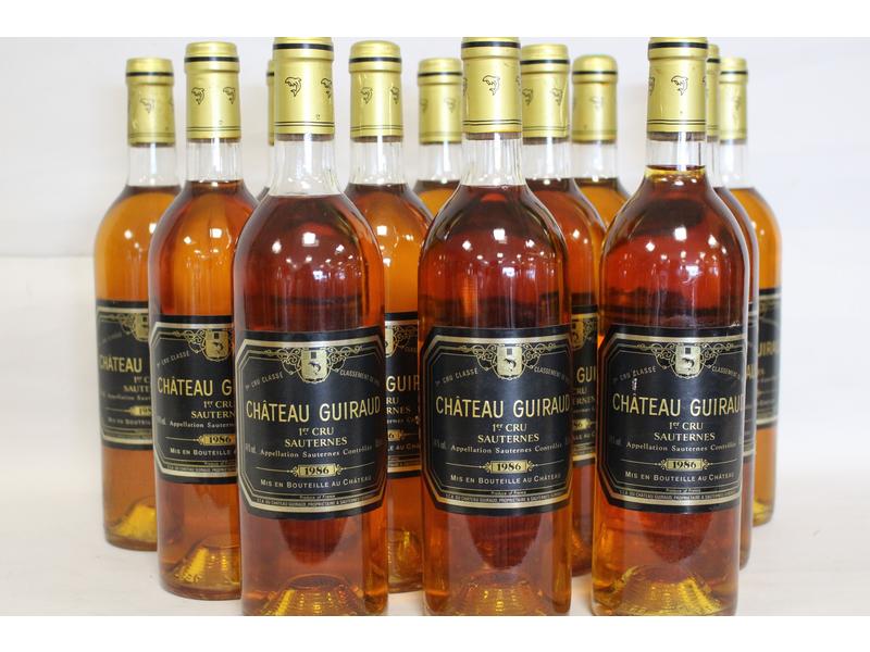 12 Blles CH. GUIRAUD Sauternes 1er CC 19...