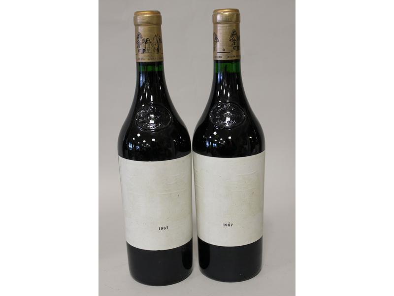 2 Blles CH. HAUT BRION Graves 1er GCC 19...