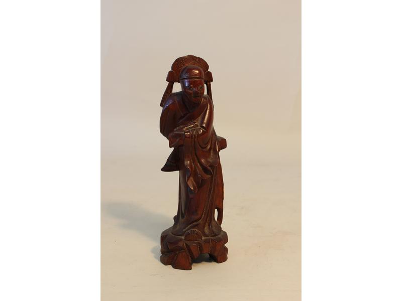 SCULPTURE en bois exotique représentant une...