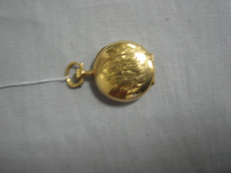 MONTRE DE COL en or jaune. (Manque le verre...