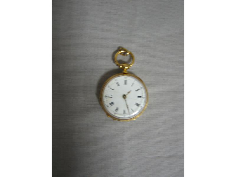 MONTRE DE COL en or jaune et ors de couleurs...