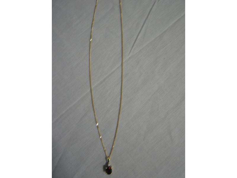 COLLIER en or jaune à décor d'une pierre...