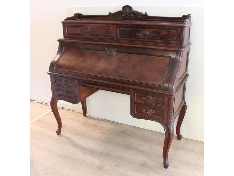 BUREAU à cylindre en palissandre et placage...