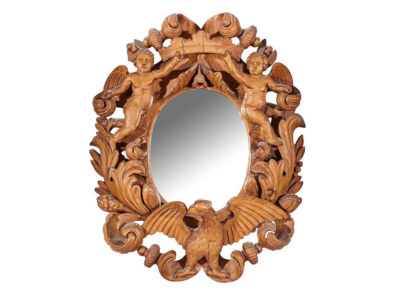 PETIT MIROIR ovale en bois sculpté représentant...
