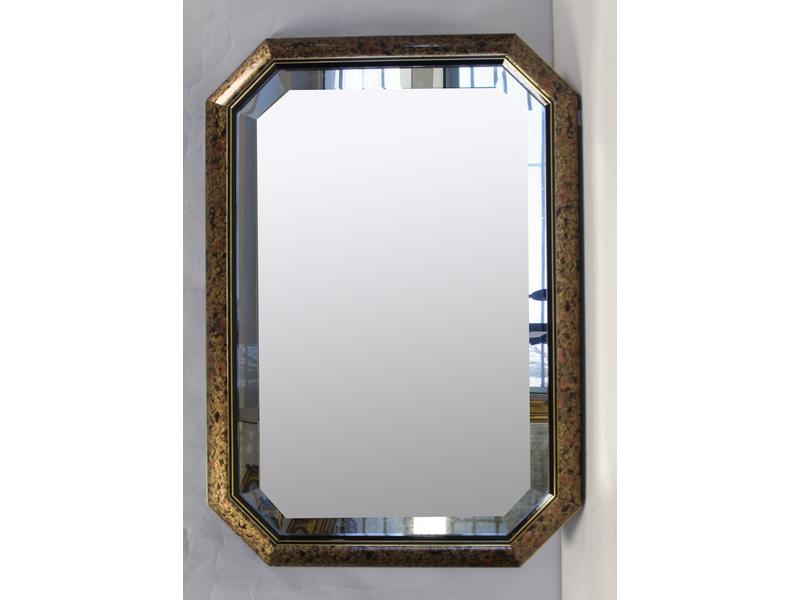 MIROIR moderne noir et or à pans coupés.