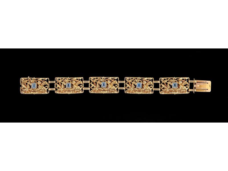 BRACELET en or jaune (18K) à 5 maillons articulés...