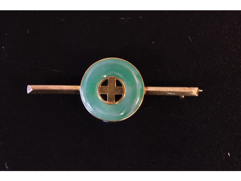 BROCHE BARRETTE en or jaune (14K) ornée au...