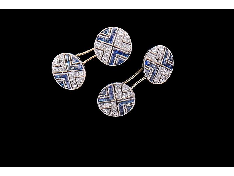 PAIRE DE BOUTONS DE MANCHETTES en or gris...