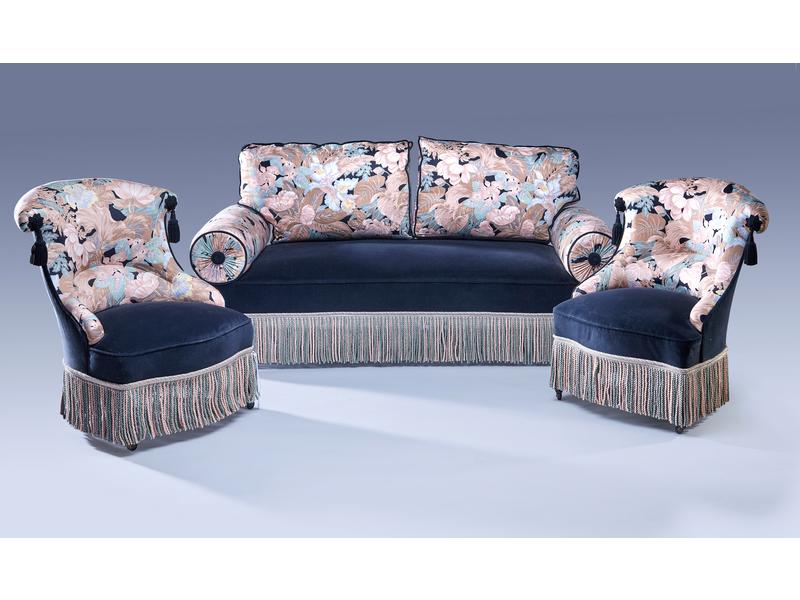 PAIRE DE FAUTEUILS dit "crapaud" ET BANQUETTE...