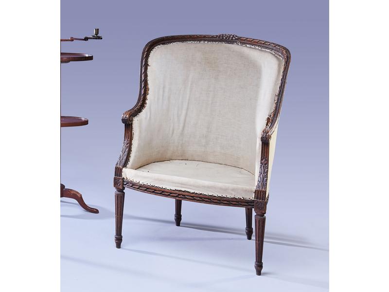 BERGERE en hêtre mouluré et sculpté de rubans,...