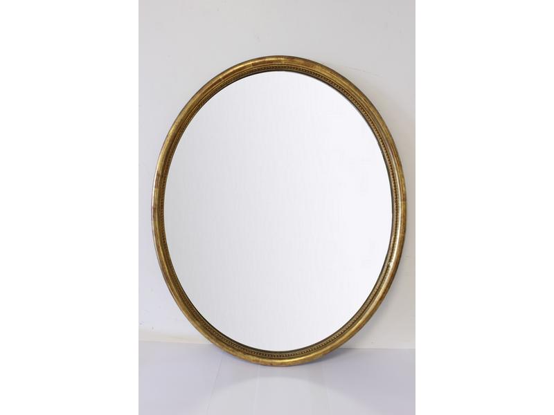 MIROIR ovale en bois doré à filet de per...